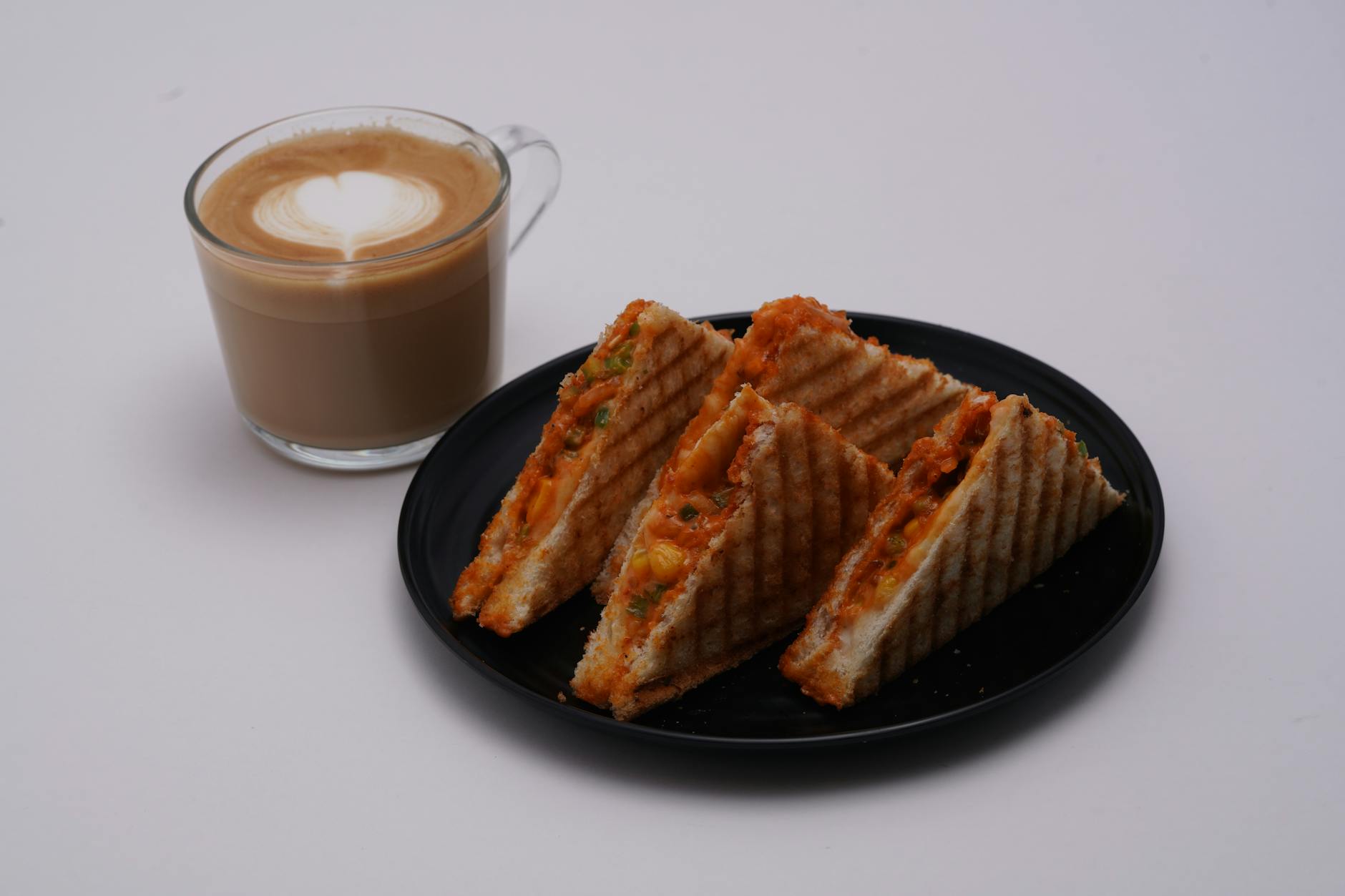 Casual cafe sandwich and coffee on table