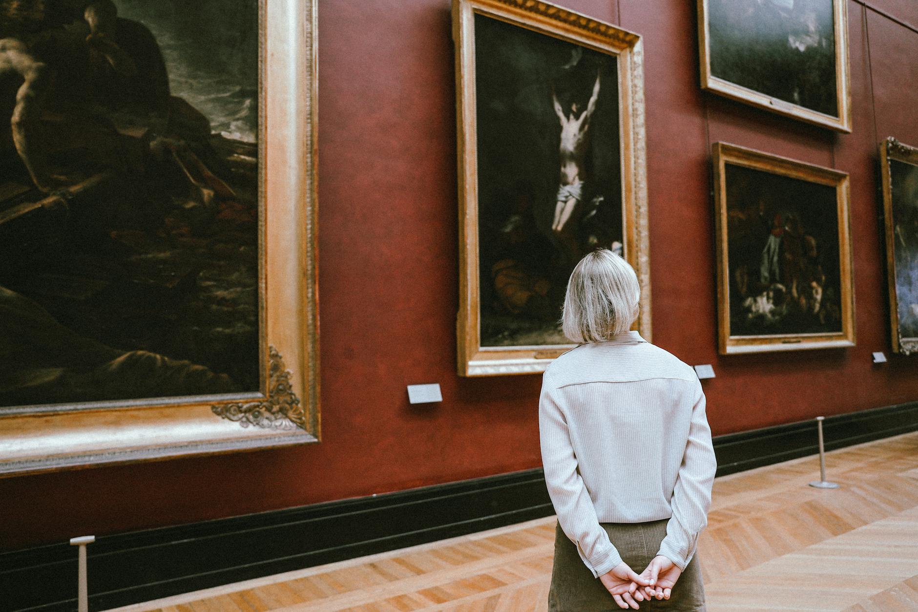 Art gallery visitors in museum exhibition