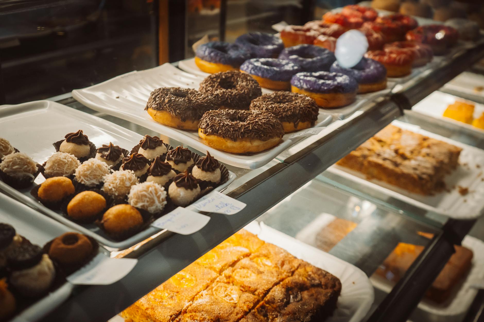 Bakery counter with fresh pastries and donuts