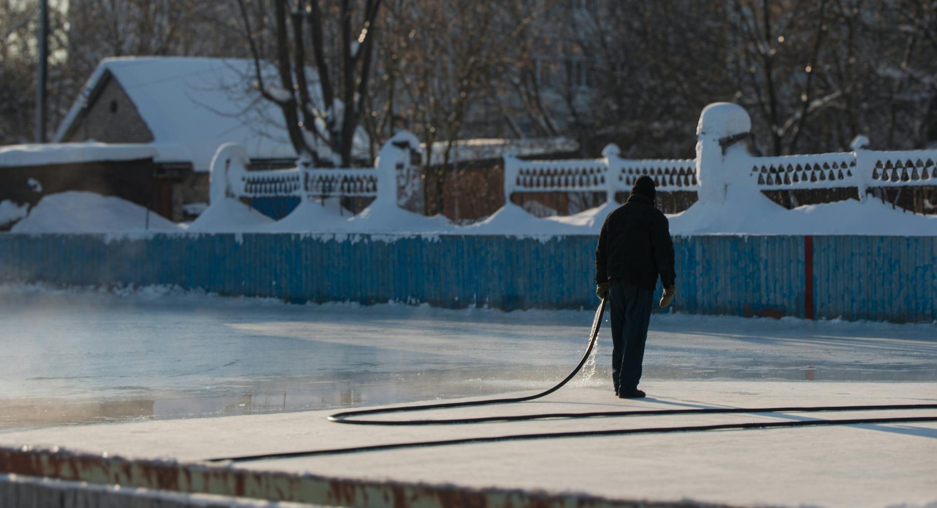 Outdoor ice skating rink in winter