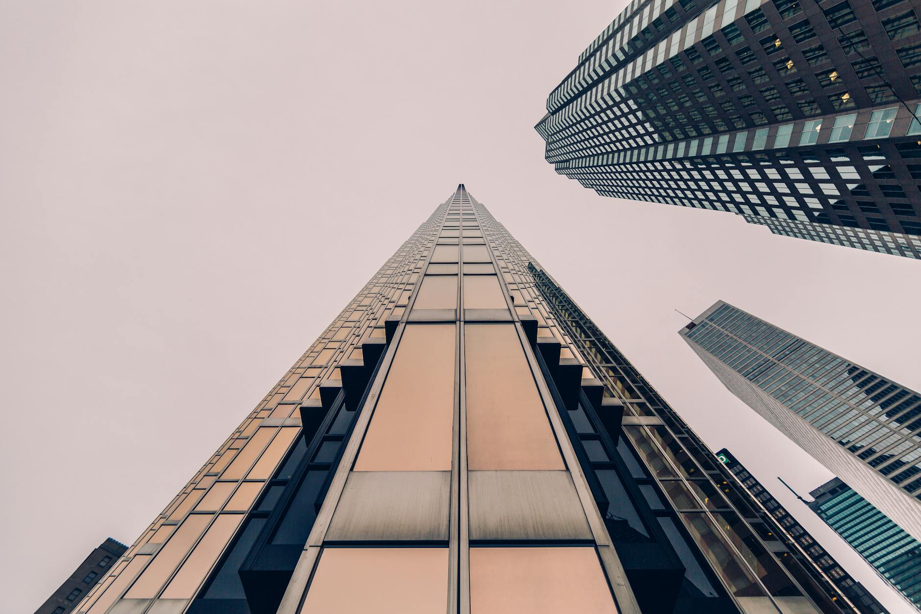 Tall tower with city skyline backdrop
