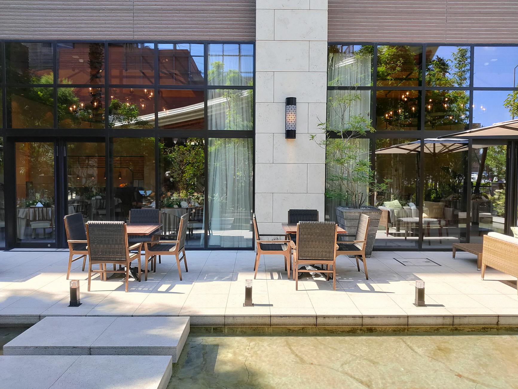 Outdoor restaurant patio dining among trees