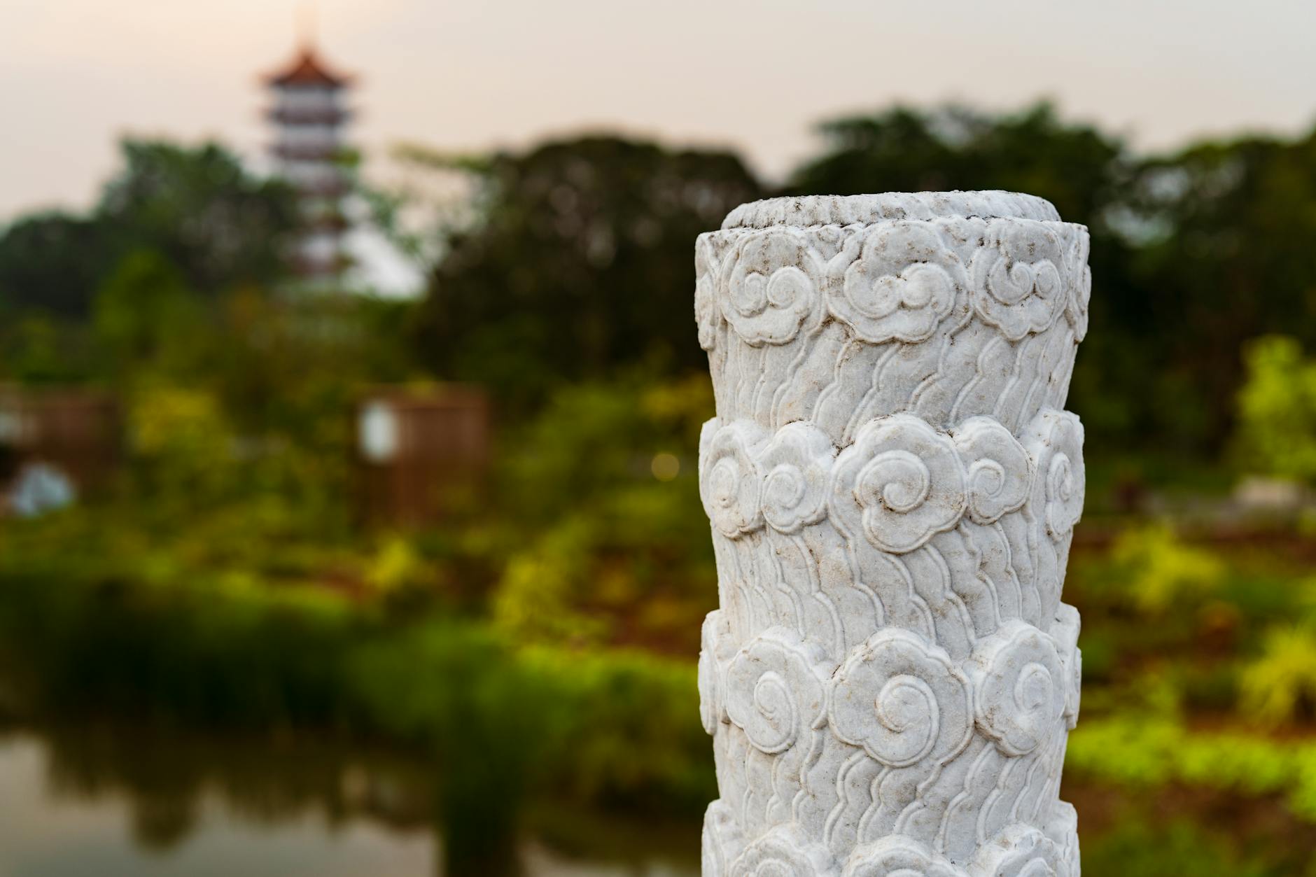 Chinese garden stone bridge over pond