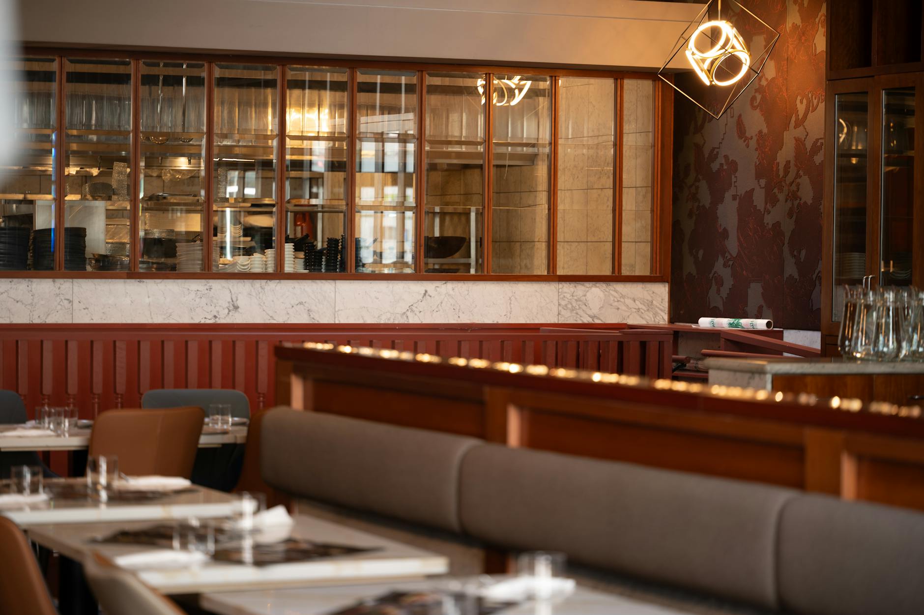 Sophisticated dining setting in a Vancouver restaurant with modern decor and warm ambiance.