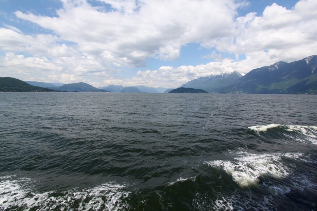 Howe Sound's islands and mountains seen from the water near Horseshoe Bay