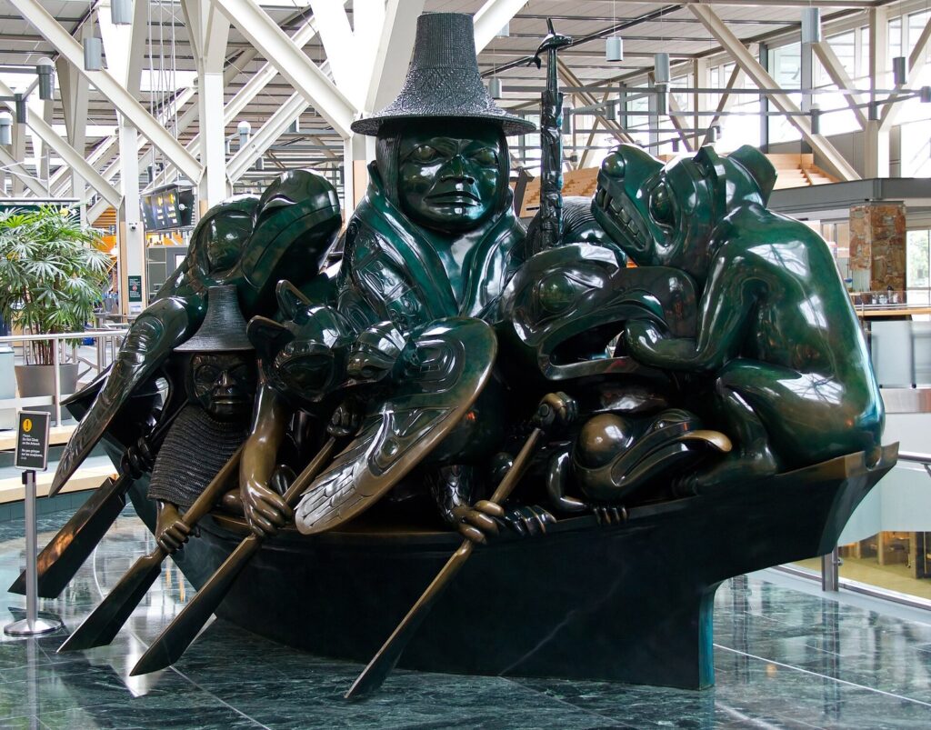 Bill Reid's green bronze sculpture The Spirit of Haida Gwaii, The Jade Canoe, in the international terminal at Vancouver airport