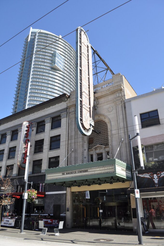 The Orpheum's tall vertical sign and marquee on Granville Street in downtown Vancouver