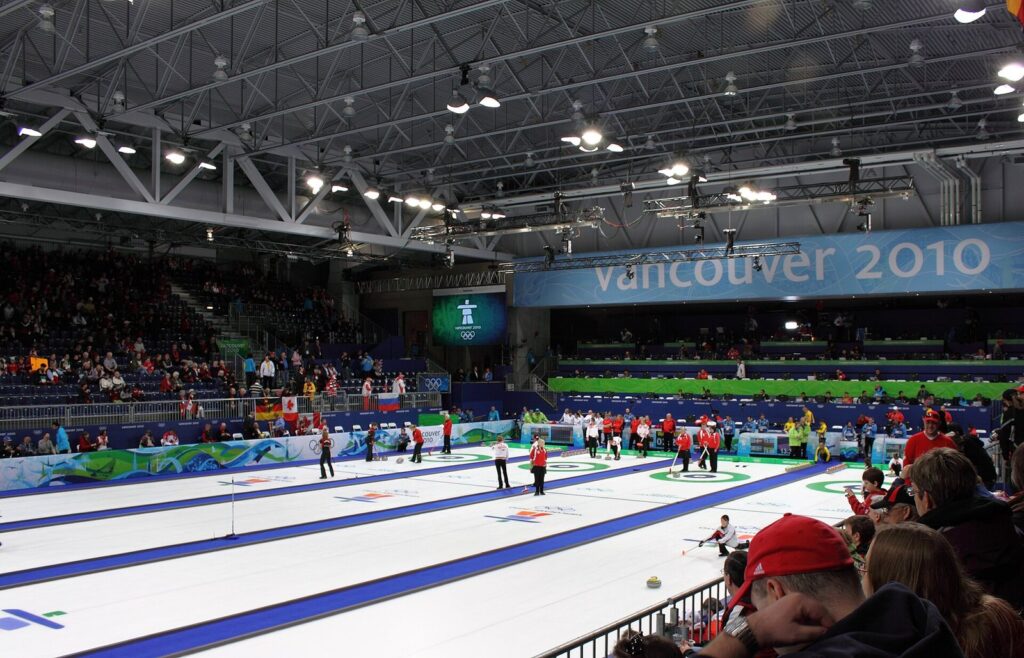 Curling sheets and spectators inside the Vancouver Olympic Centre during the 2010 Winter Games