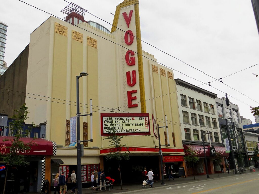 The Vogue Theatre's art deco facade and vertical sign on Granville Street